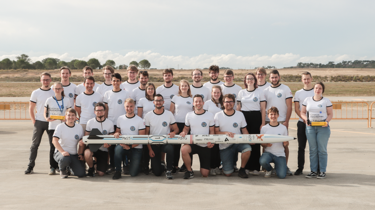 Group picture Aerospace Team Graz with rocket